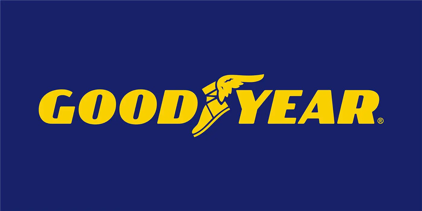 A blue and yellow goodyear logo on top of a blue background.